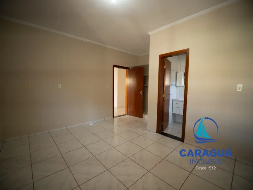 Foto 7 de Casa com 3 quartos para alugar, 130m2 em Martim de Sá, Caraguatatuba - SP
