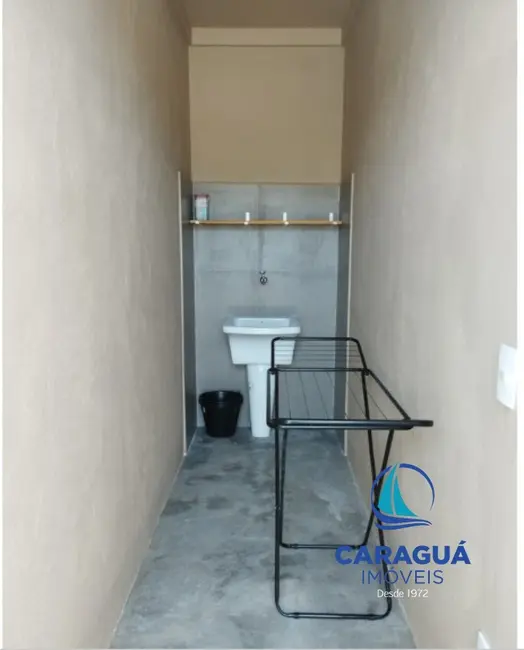 Foto 3 de Kitnet com 1 quarto para alugar, 45m2 em Travessão, Caraguatatuba - SP