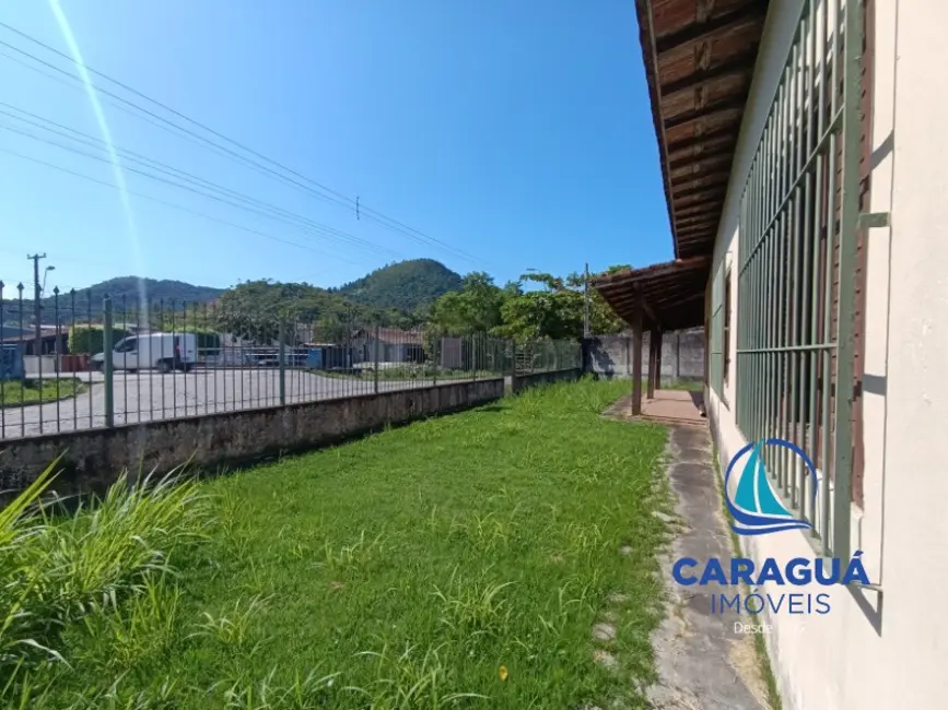 Foto 2 de Casa com 4 quartos à venda, 148m2 em Martim de Sá, Caraguatatuba - SP