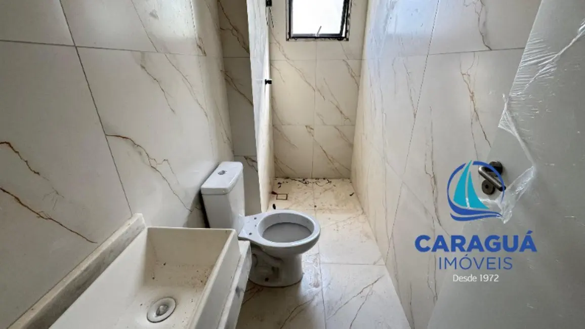 Foto 7 de Apartamento com 2 quartos à venda, 54m2 em Balneário Forest, Caraguatatuba - SP