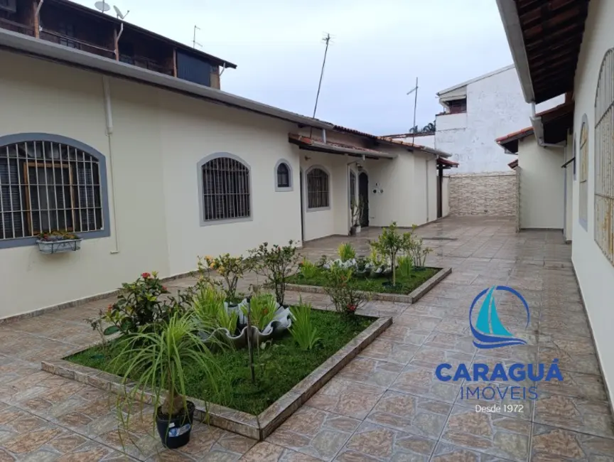 Casa de Condomínio com 2 quartos à venda, 130m2 em Martim de Sá, Caraguatatuba - SP - imagem 1 Foto 1 de Casa de Condomínio com 2 quartos à venda, 130m2 em Martim de Sá, Caraguatatuba - SP