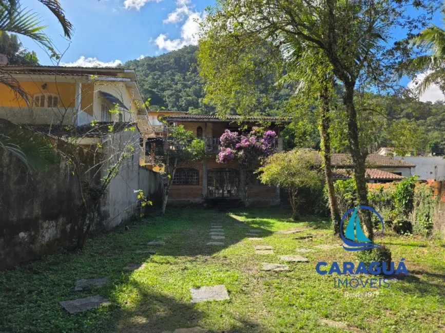 Foto 33 de Casa à venda, 167m2 em Cidade Jardim, Caraguatatuba - SP