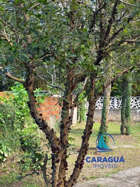 Foto 11 de Casa à venda, 167m2 em Cidade Jardim, Caraguatatuba - SP