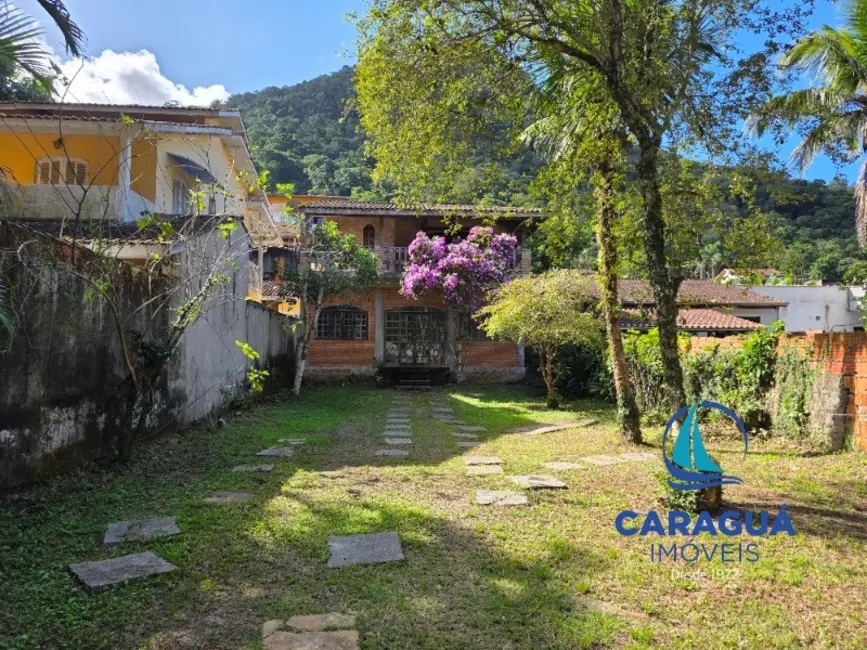 Foto 2 de Casa à venda, 167m2 em Cidade Jardim, Caraguatatuba - SP