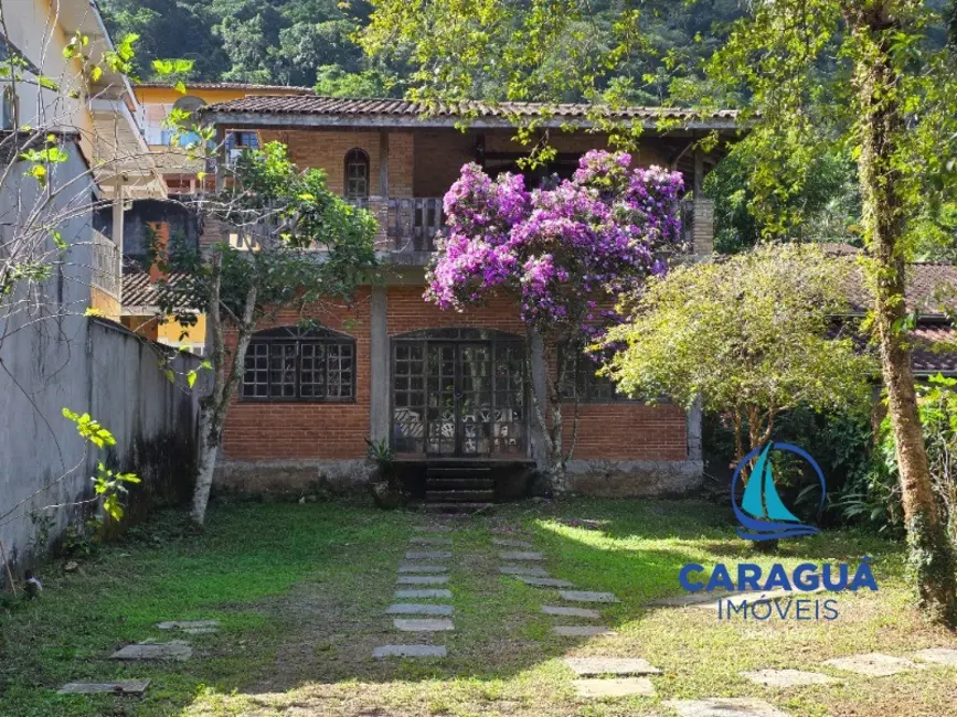 Foto 3 de Casa à venda, 167m2 em Cidade Jardim, Caraguatatuba - SP