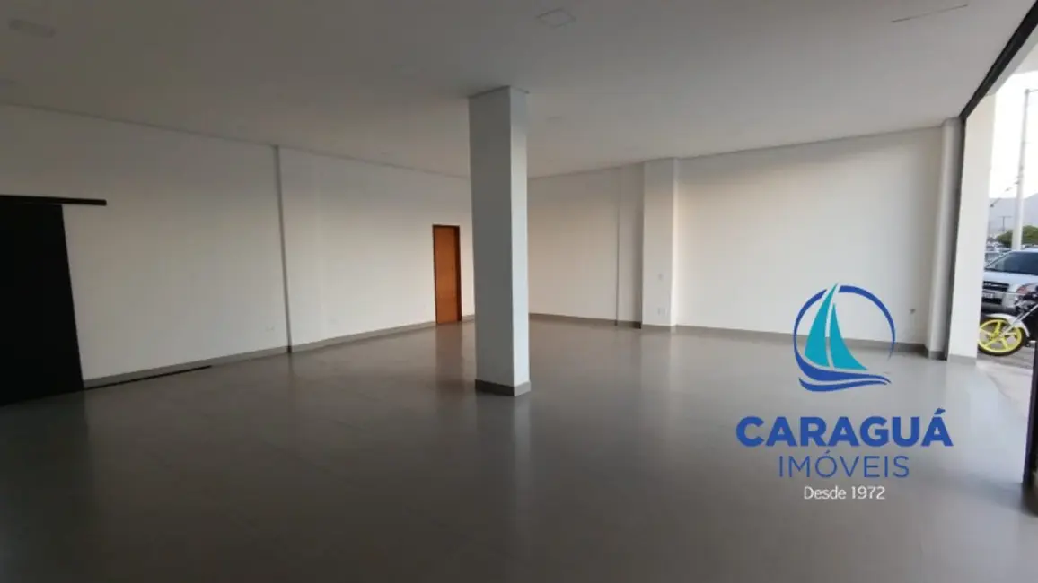 Foto 9 de Sala Comercial para alugar, 100m2 em Jardim Porto Novo, Caraguatatuba - SP