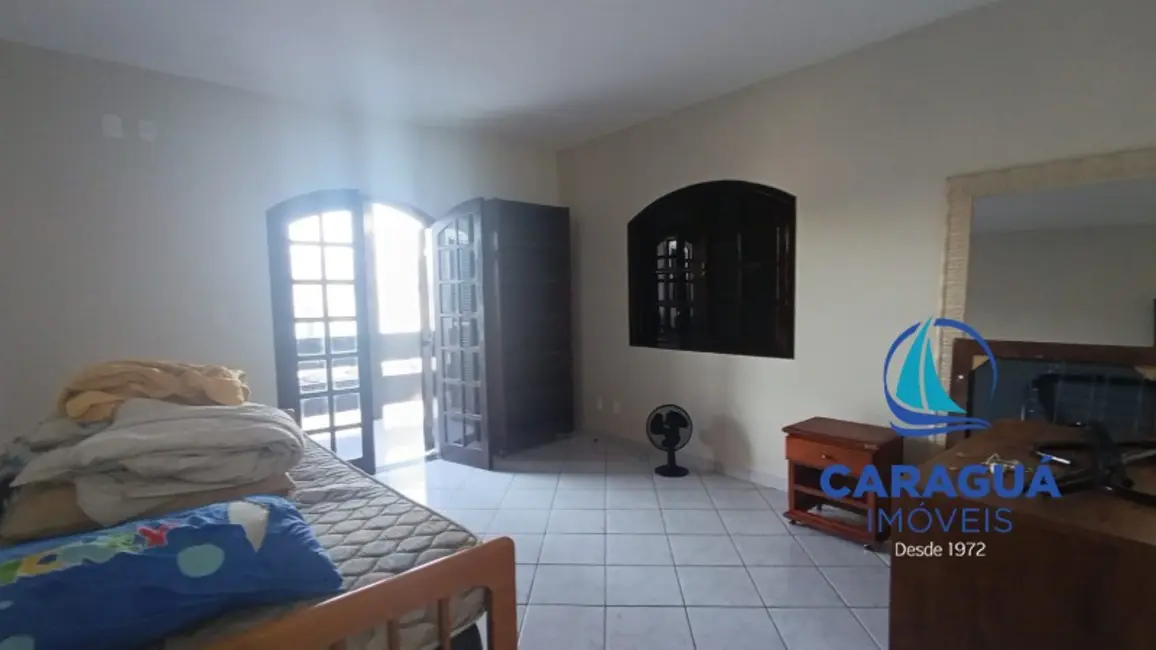 Foto 9 de Casa com 2 quartos para alugar, 100m2 em Indaiá, Caraguatatuba - SP