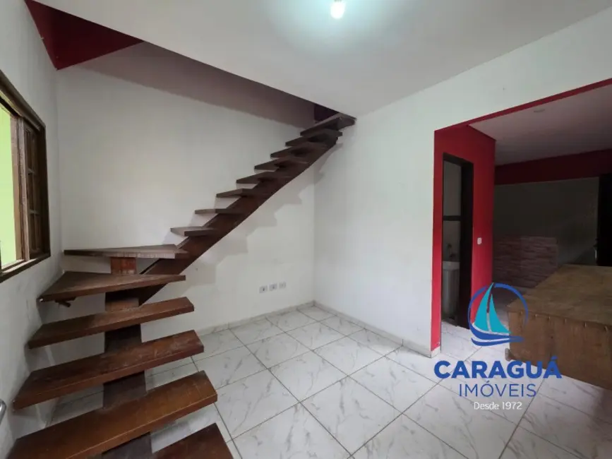 Foto 1 de Casa com 2 quartos para alugar, 75m2 em Travessão, Caraguatatuba - SP