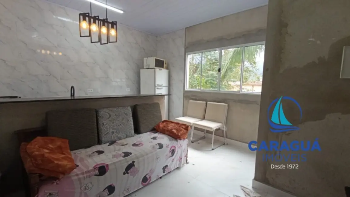 Foto 1 de Casa com 1 quarto para alugar, 35m2 em Martim de Sá, Caraguatatuba - SP