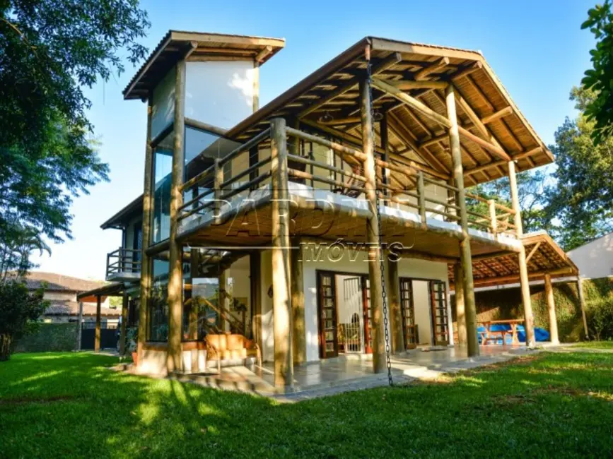 Foto 1 de Casa de Condomínio com 6 quartos à venda, 139m2 em Ubatuba - SP