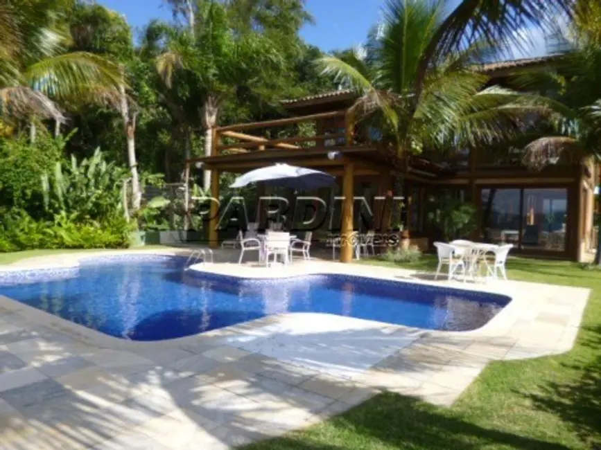 Foto 1 de Casa de Condomínio com 6 quartos à venda em Ubatuba - SP