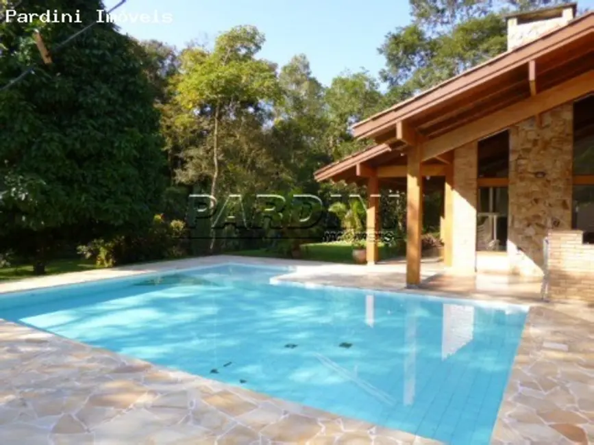 Foto 1 de Casa de Condomínio com 4 quartos à venda em Ubatuba - SP