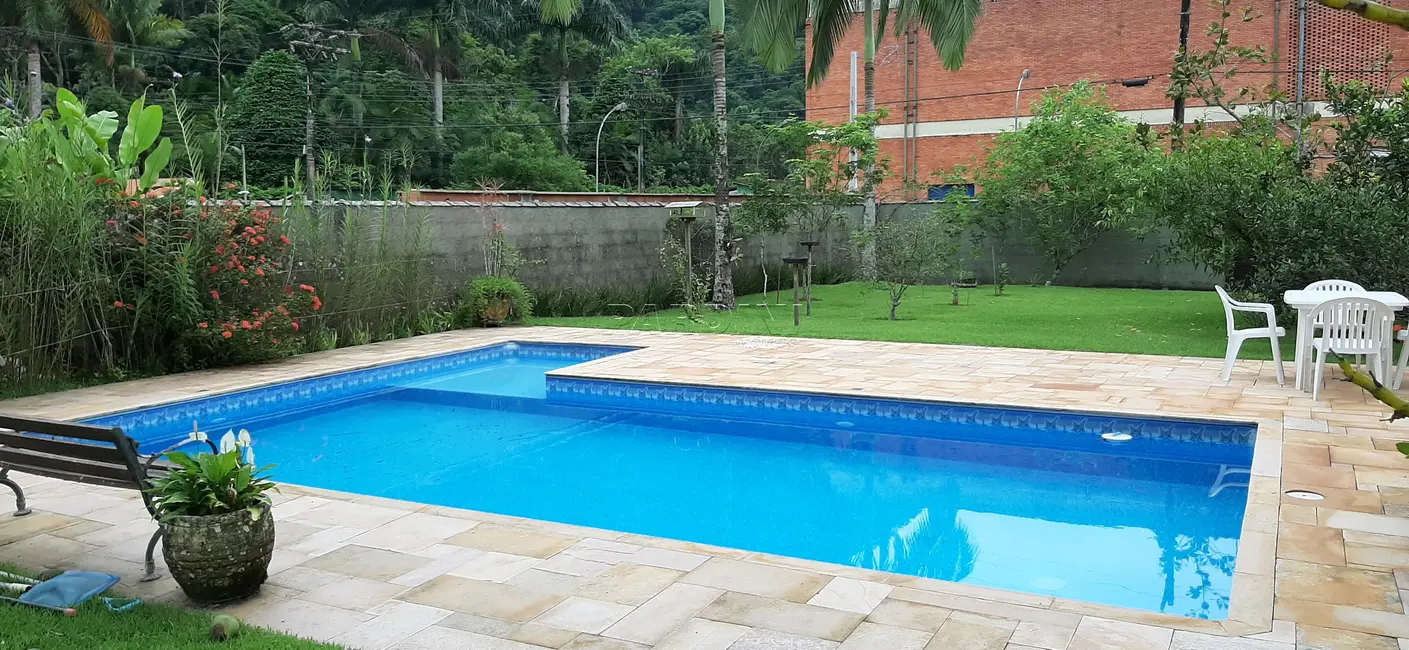 Foto 2 de Casa de Condomínio com 4 quartos à venda em Ubatuba - SP