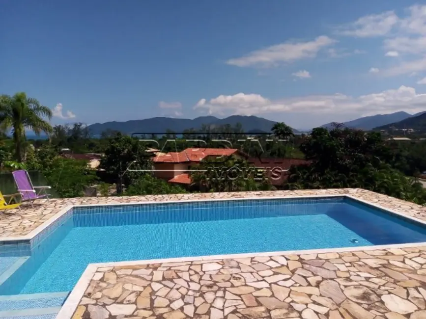 Foto 1 de Casa de Condomínio com 3 quartos à venda em Ubatuba - SP