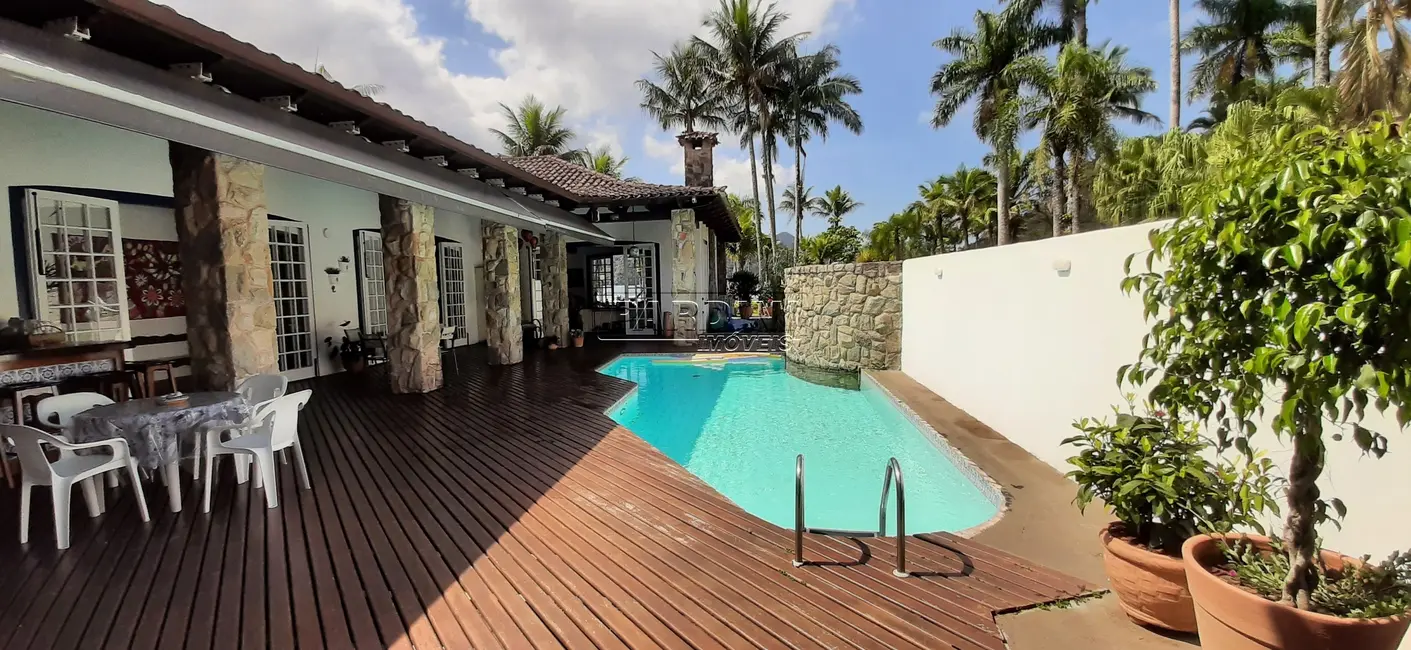 Foto 1 de Casa de Condomínio com 7 quartos à venda, 750m2 em Ubatuba - SP