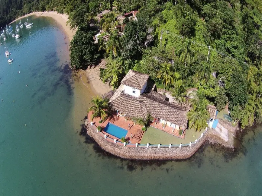 Foto 1 de Casa com 4 quartos à venda em Ubatuba - SP