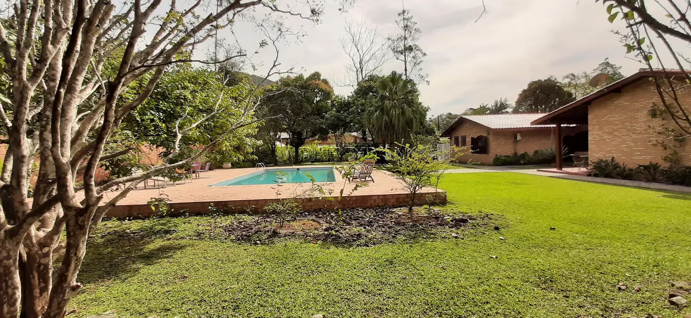 Foto 1 de Casa de Condomínio com 5 quartos à venda, 302m2 em Ubatuba - SP