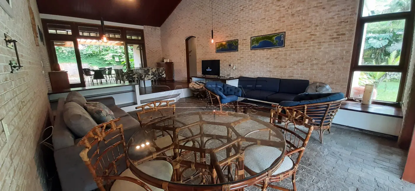 Foto 1 de Casa de Condomínio com 4 quartos à venda, 217m2 em Ubatuba - SP