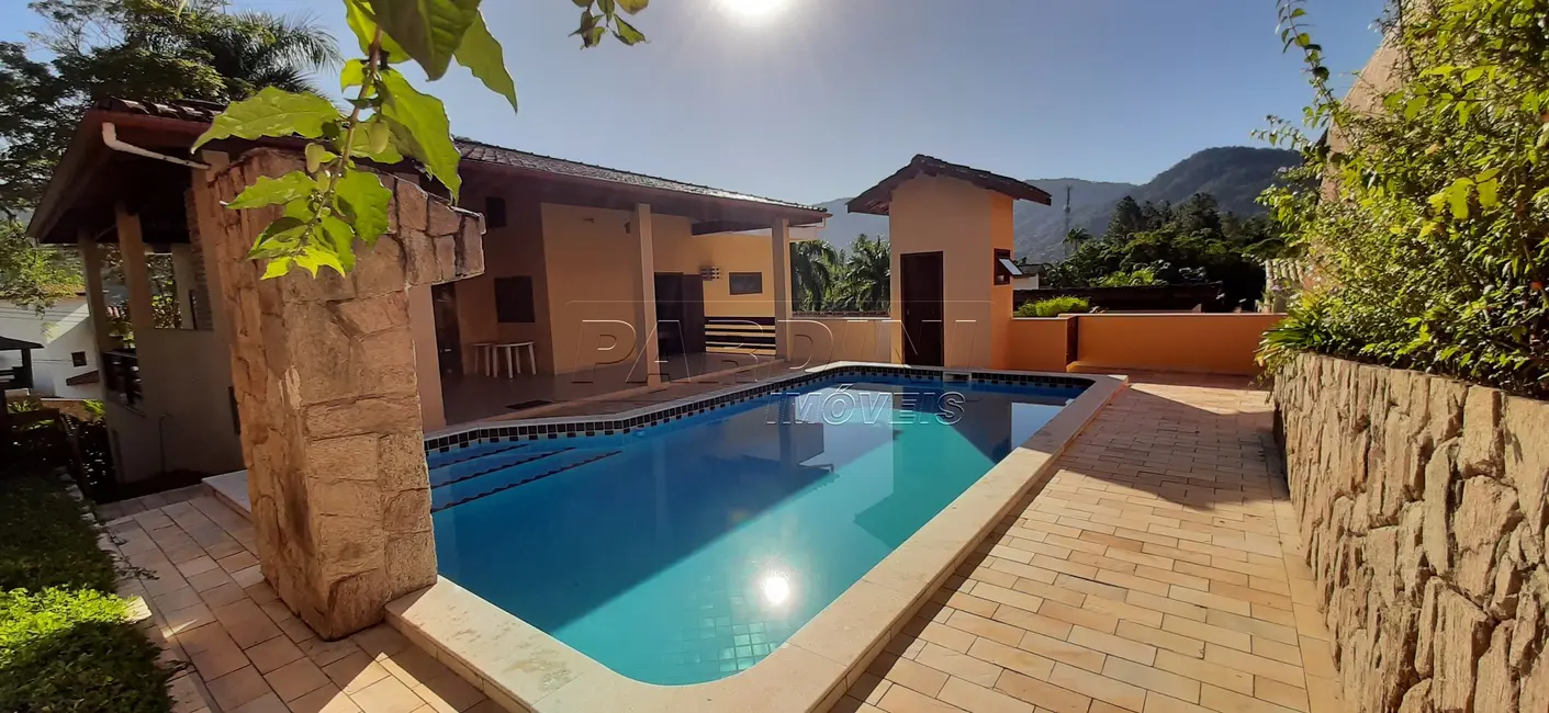 Foto 1 de Casa de Condomínio com 4 quartos à venda, 386m2 em Ubatuba - SP