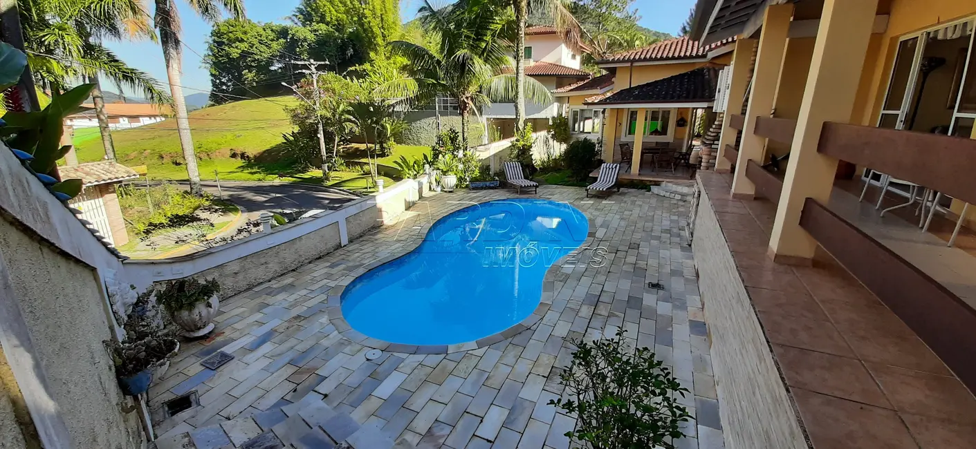 Foto 1 de Casa de Condomínio com 4 quartos à venda, 150m2 em Ubatuba - SP