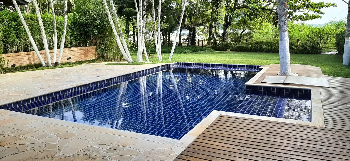Foto 1 de Casa de Condomínio com 4 quartos à venda, 215m2 em Ubatuba - SP