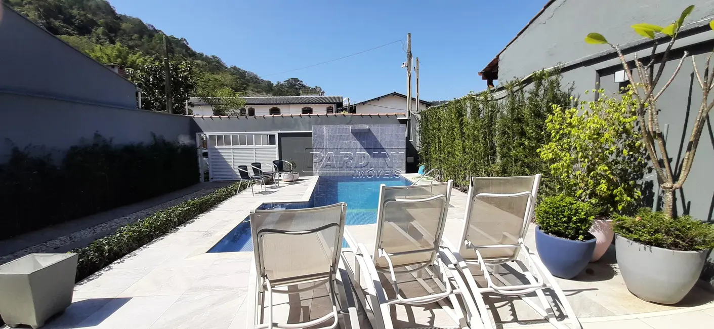 Foto 4 de Casa com 5 quartos à venda, 178m2 em Ubatuba - SP