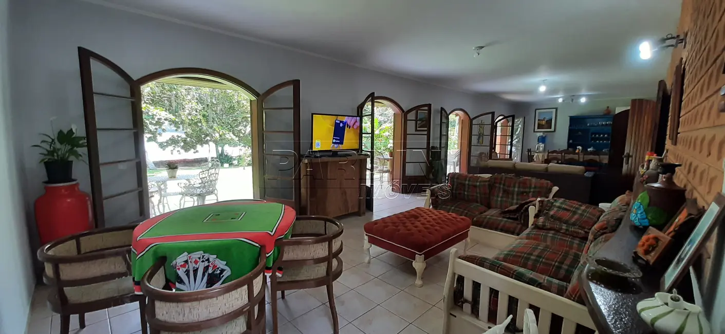 Foto 1 de Casa de Condomínio com 4 quartos à venda, 413m2 em Ubatuba - SP