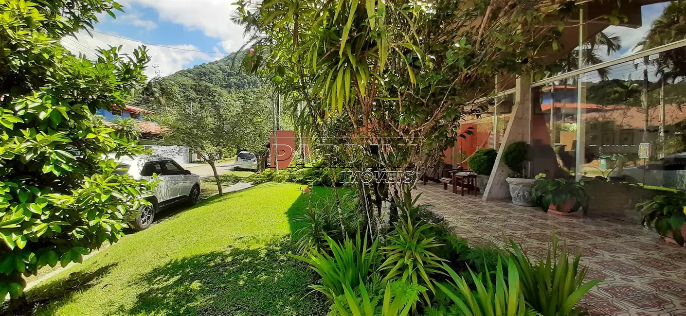 Casa de Condomínio com 5 quartos para alugar, 287m2 em Ubatuba - SP - imagem 3 Foto 3 de Casa de Condomínio com 5 quartos para alugar, 287m2 em Ubatuba - SP