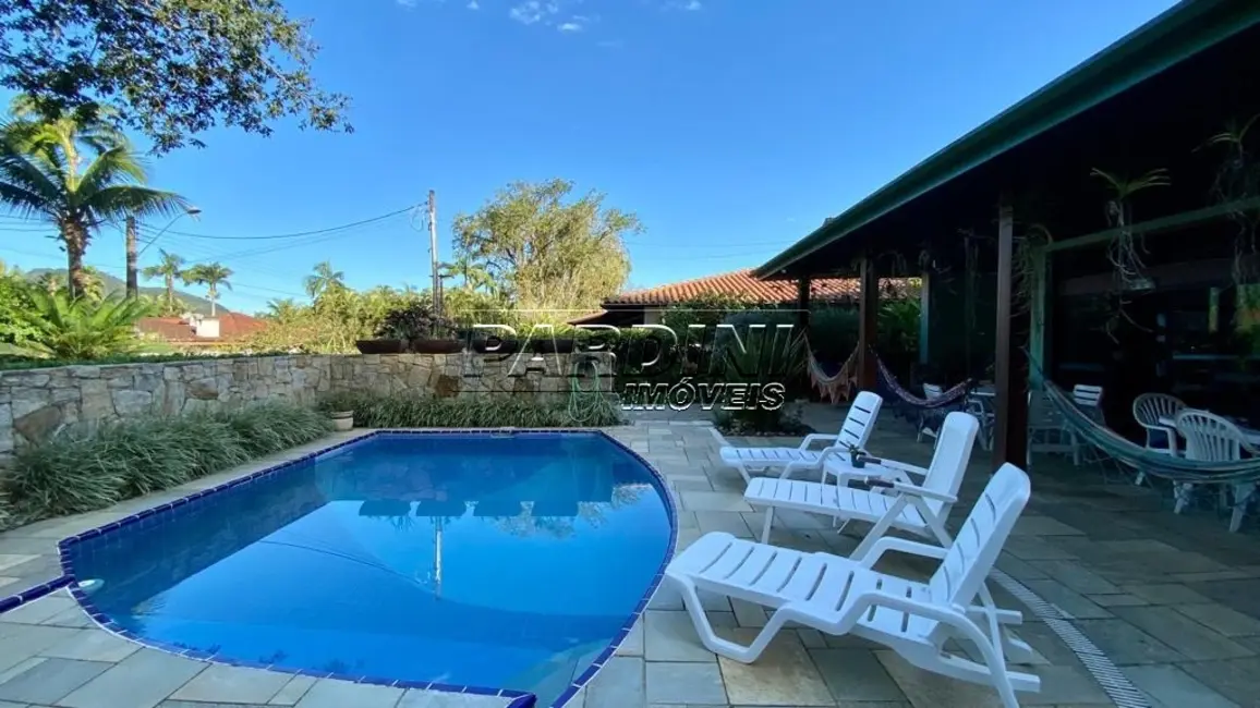 Foto 1 de Casa de Condomínio com 4 quartos à venda, 256m2 em Ubatuba - SP