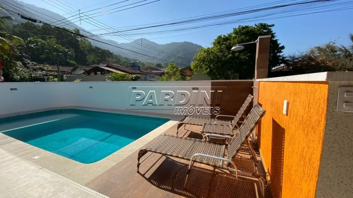 Foto 1 de Casa de Condomínio com 4 quartos à venda, 115m2 em Ubatuba - SP