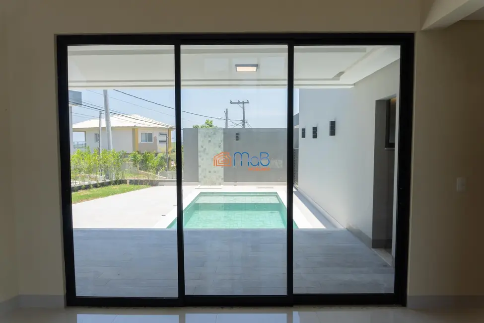 Casa de Condomínio com 4 quartos para alugar, 235m2 em Lagoa, Macae - RJ - imagem 4 Foto 4 de Casa de Condomínio com 4 quartos para alugar, 235m2 em Lagoa, Macae - RJ