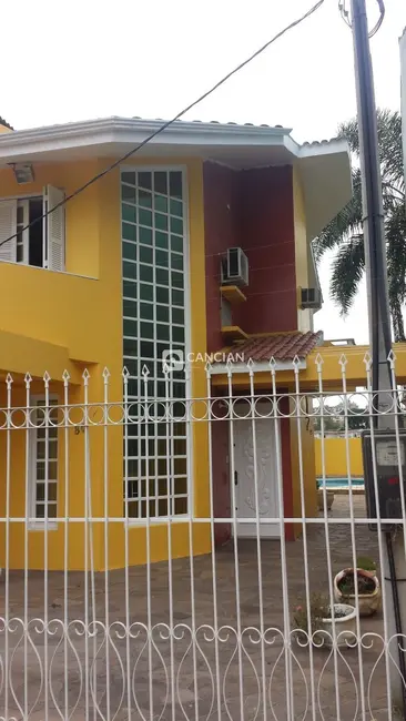Foto 2 de Casa com 6 quartos à venda, 360m2 em Nossa Senhora Medianeira, Santa Maria - RS