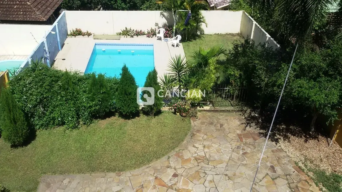 Casa com 4 quartos à venda, 411m2 em Nossa Senhora de Lourdes, Santa Maria - RS - imagem 4 Foto 4 de Casa com 4 quartos à venda, 411m2 em Nossa Senhora de Lourdes, Santa Maria - RS