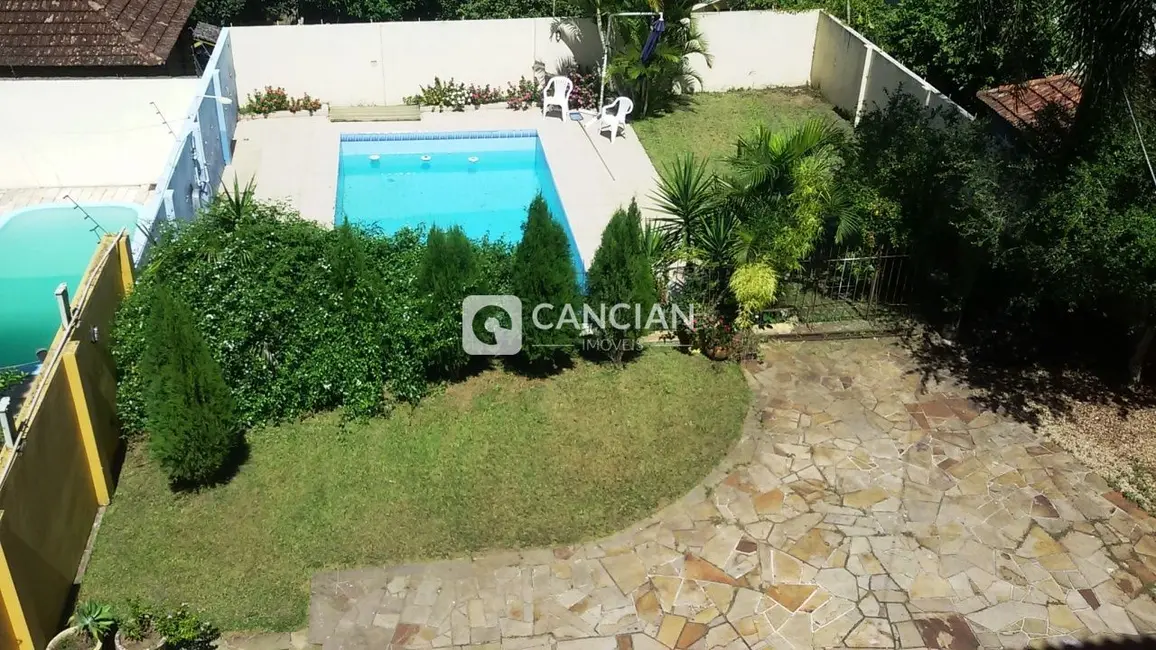 Casa com 4 quartos à venda, 411m2 em Nossa Senhora de Lourdes, Santa Maria - RS - imagem 3 Foto 3 de Casa com 4 quartos à venda, 411m2 em Nossa Senhora de Lourdes, Santa Maria - RS