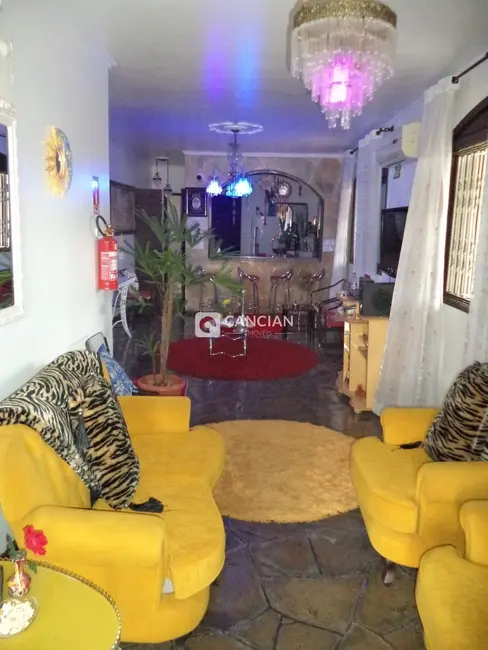 Casa com 7 quartos à venda, 267m2 em Juscelino Kubitschek, Santa Maria - RS - imagem 5 Foto 5 de Casa com 7 quartos à venda, 267m2 em Juscelino Kubitschek, Santa Maria - RS