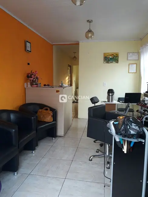 Casa com 3 quartos à venda, 119m2 em Juscelino Kubitschek, Santa Maria - RS - imagem 3 Foto 3 de Casa com 3 quartos à venda, 119m2 em Juscelino Kubitschek, Santa Maria - RS