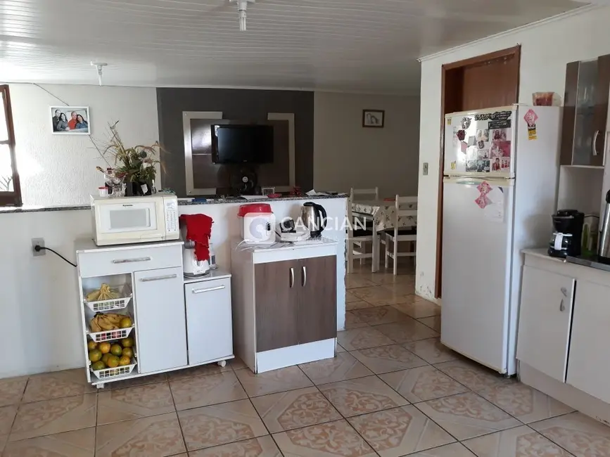 Casa com 4 quartos à venda, 114m2 em Juscelino Kubitschek, Santa Maria - RS - imagem 4 Foto 4 de Casa com 4 quartos à venda, 114m2 em Juscelino Kubitschek, Santa Maria - RS