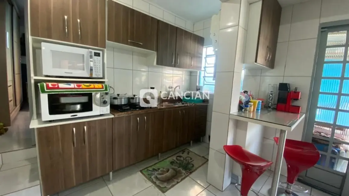 Casa com 4 quartos à venda, 130m2 em Juscelino Kubitschek, Santa Maria - RS - imagem 6 Foto 6 de Casa com 4 quartos à venda, 130m2 em Juscelino Kubitschek, Santa Maria - RS