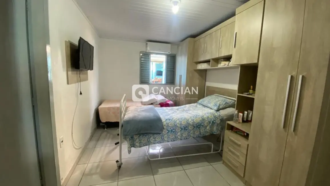 Casa com 4 quartos à venda, 130m2 em Juscelino Kubitschek, Santa Maria - RS - imagem 9 Foto 9 de Casa com 4 quartos à venda, 130m2 em Juscelino Kubitschek, Santa Maria - RS