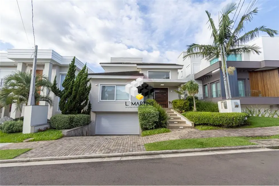Foto 1 de Casa de Condomínio com 4 quartos à venda, 368m2 em São Vicente, Gravatai - RS