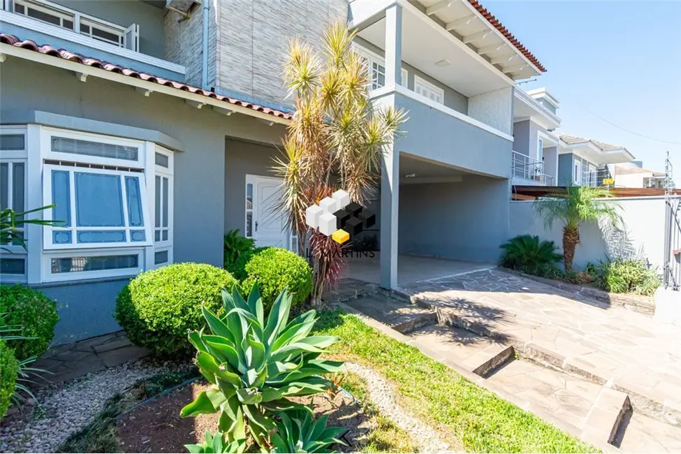 Foto 2 de Casa com 4 quartos à venda, 223m2 em Marechal Rondon, Canoas - RS