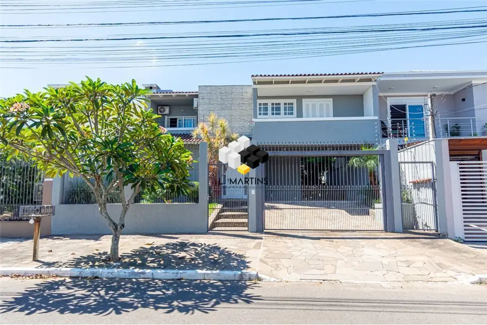 Foto 1 de Casa com 4 quartos à venda, 223m2 em Marechal Rondon, Canoas - RS