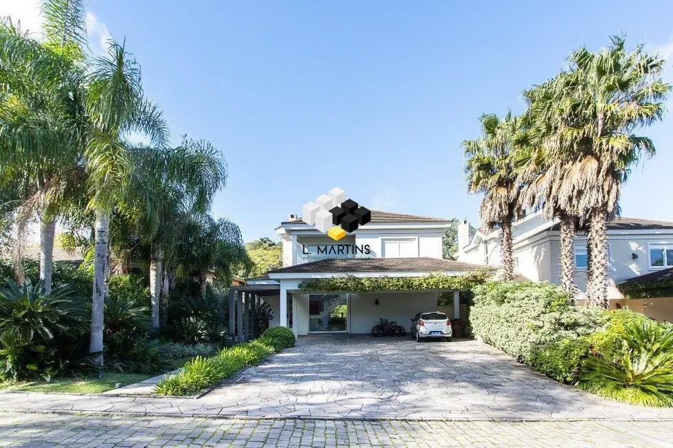 Foto 1 de Casa com 5 quartos à venda, 457m2 em Pedra Redonda, Porto Alegre - RS
