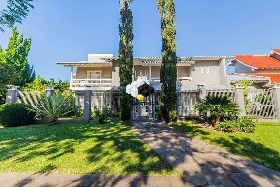 Casa com 4 quartos à venda, 391m2 em Marechal Rondon, Canoas - RS - imagem 1 Foto 1 de Casa com 4 quartos à venda, 391m2 em Marechal Rondon, Canoas - RS