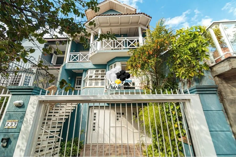 Foto 1 de Casa com 4 quartos à venda, 410m2 em Chácara das Pedras, Porto Alegre - RS