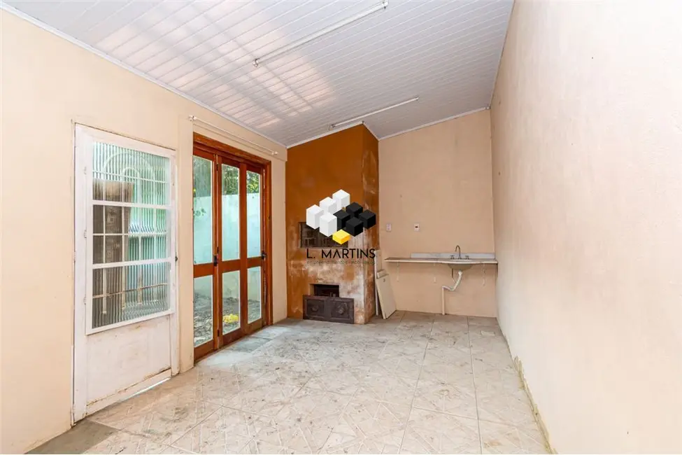 Casa com 4 quartos à venda, 113m2 em Harmonia, Canoas - RS - imagem 5 Foto 5 de Casa com 4 quartos à venda, 113m2 em Harmonia, Canoas - RS