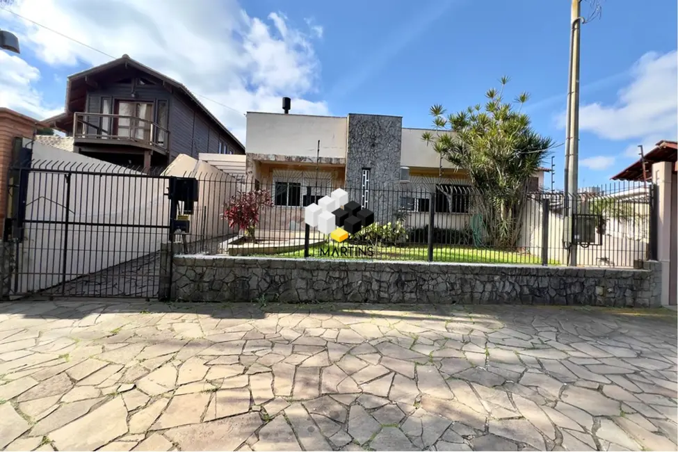 Casa com 3 quartos à venda, 170m2 em Igara, Canoas - RS - imagem 1 Foto 1 de Casa com 3 quartos à venda, 170m2 em Igara, Canoas - RS