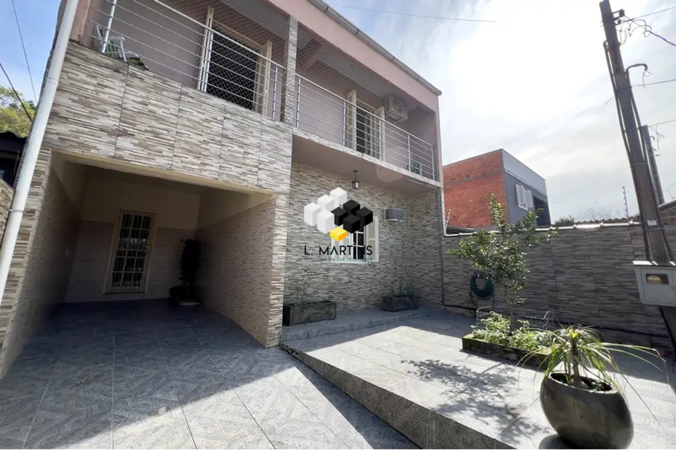 Casa com 3 quartos à venda, 193m2 em Olaria, Canoas - RS - imagem 4 Foto 4 de Casa com 3 quartos à venda, 193m2 em Olaria, Canoas - RS