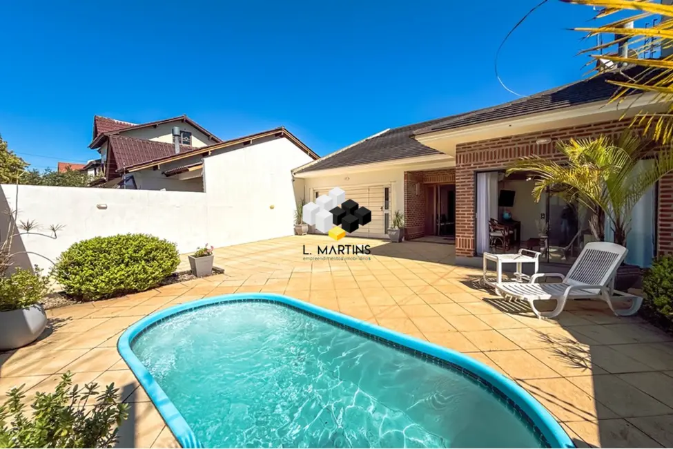 Casa com 3 quartos à venda, 210m2 em Estância Velha, Canoas - RS - imagem 1 Foto 1 de Casa com 3 quartos à venda, 210m2 em Estância Velha, Canoas - RS