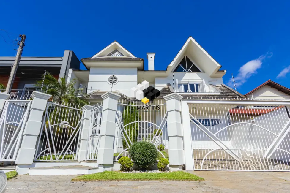 Casa com 4 quartos à venda, 331m2 em Canoas - RS - imagem 1 Foto 1 de Casa com 4 quartos à venda, 331m2 em Canoas - RS